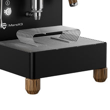 Lelit Coffee Machine Black coffee machine with wooden feet on a white background