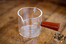 Measuring Glass with Wooden Handle